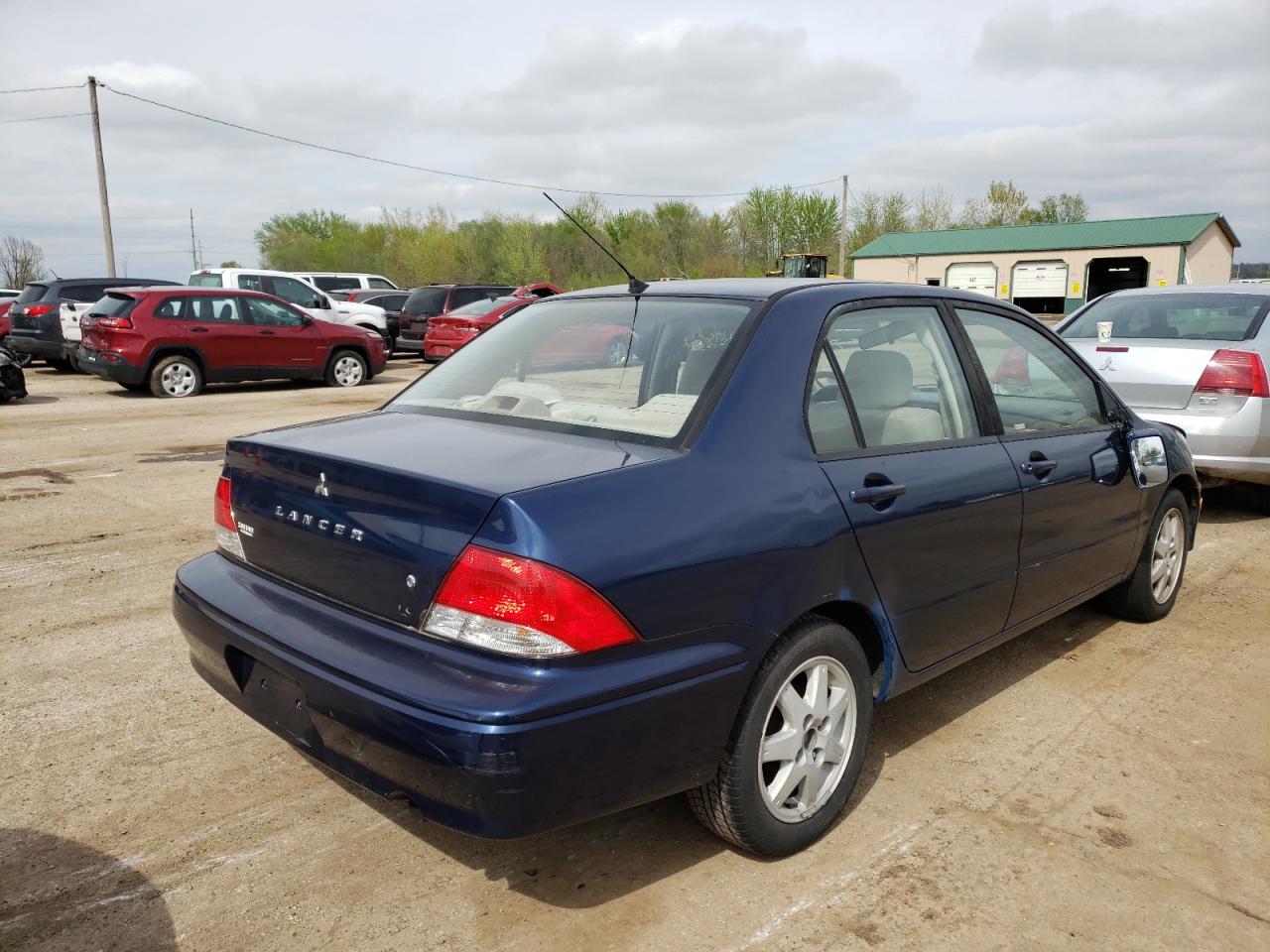 Photo 4 from auction – 2003 MITSUBISHI LANCER LS with VIN JA3AJ36E83U082383