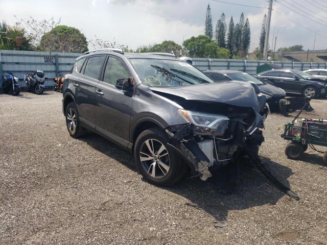TOYOTA RAV4 XLE 2017 with VIN JTMWFREV8HJ136268 - Photo from auction
