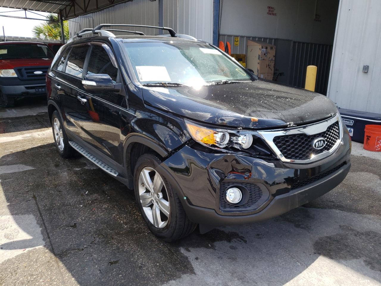 KIA SORENTO EX 2012 with VIN 5XYKU4A29CG265163 - Photo from auction