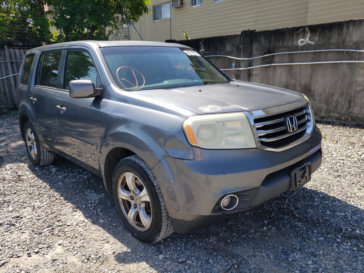 HONDA PILOT EXL 2012 with VIN 5FNYF3H57CB010002 - Photo from auction