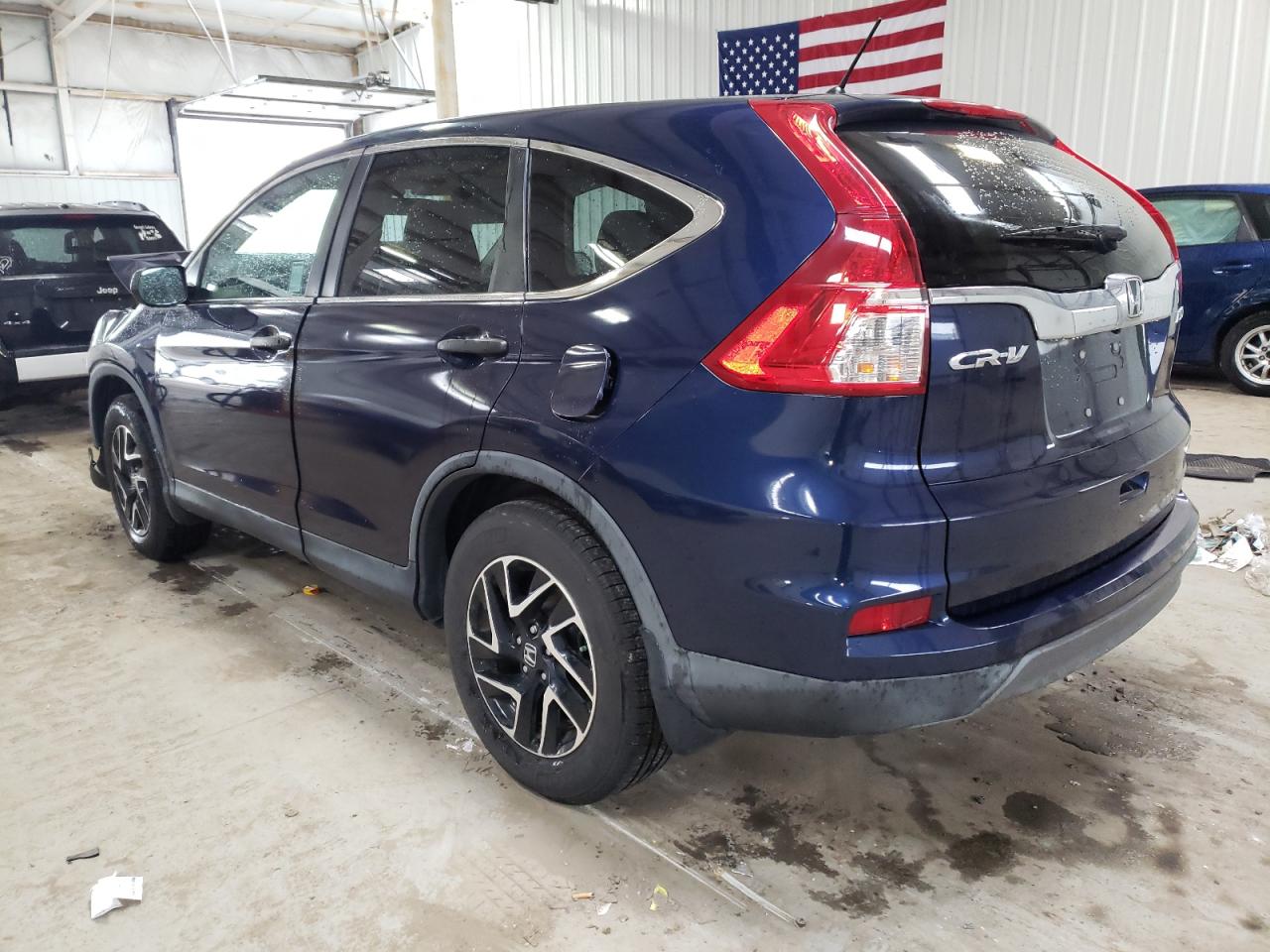 Photo 3 from auction – 2016 HONDA CR-V SE with VIN 2HKRM4H43GH618419