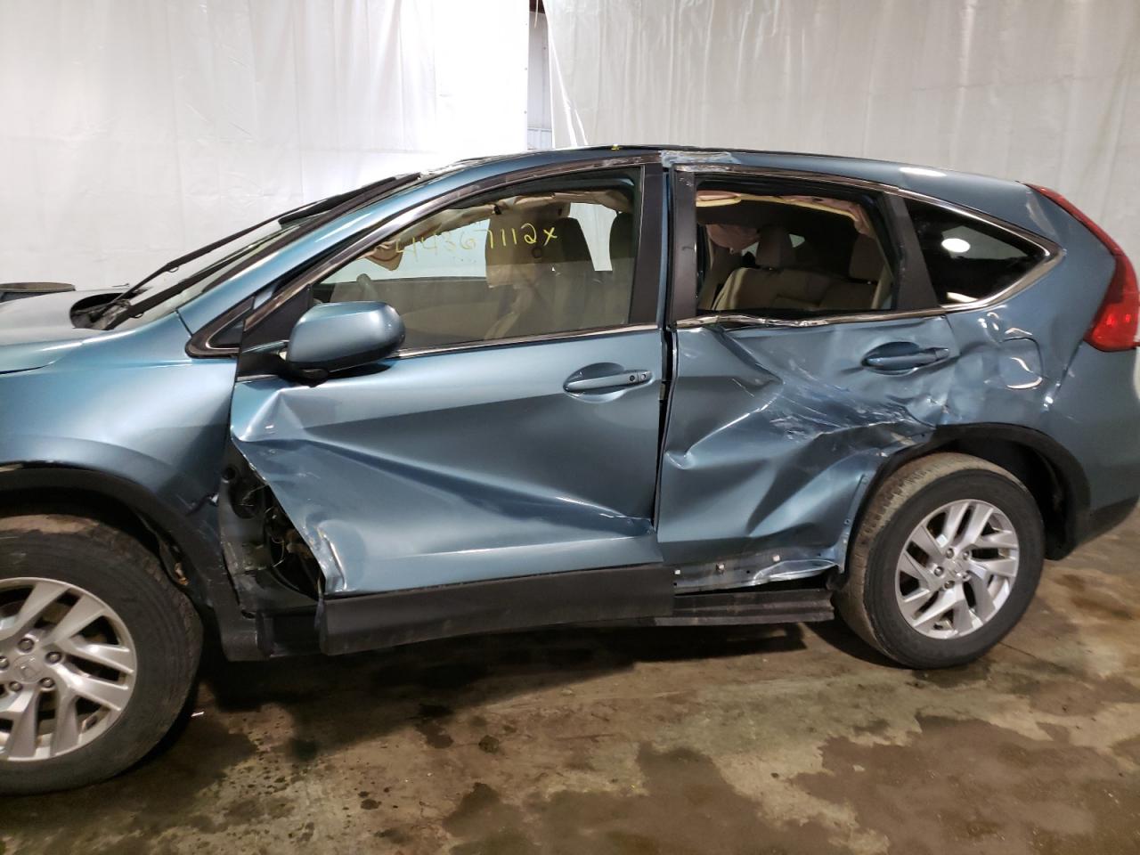 Photo 10 from auction – 2015 HONDA CR-V EX with VIN 5J6RM4H53FL101733
