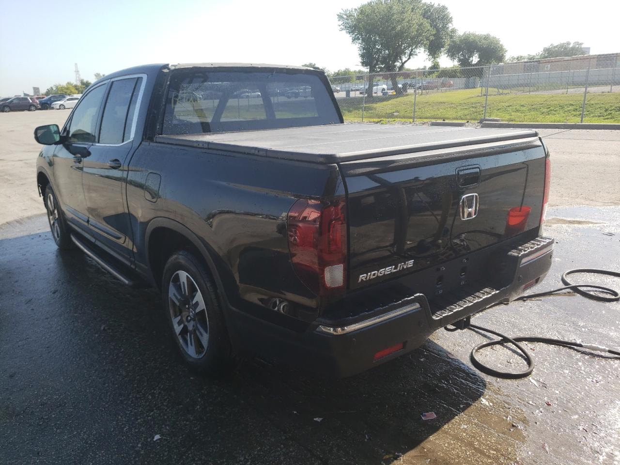 Photo 3 from auction – 2017 HONDA RIDGELINE with VIN 5FPYK2F64HB008191