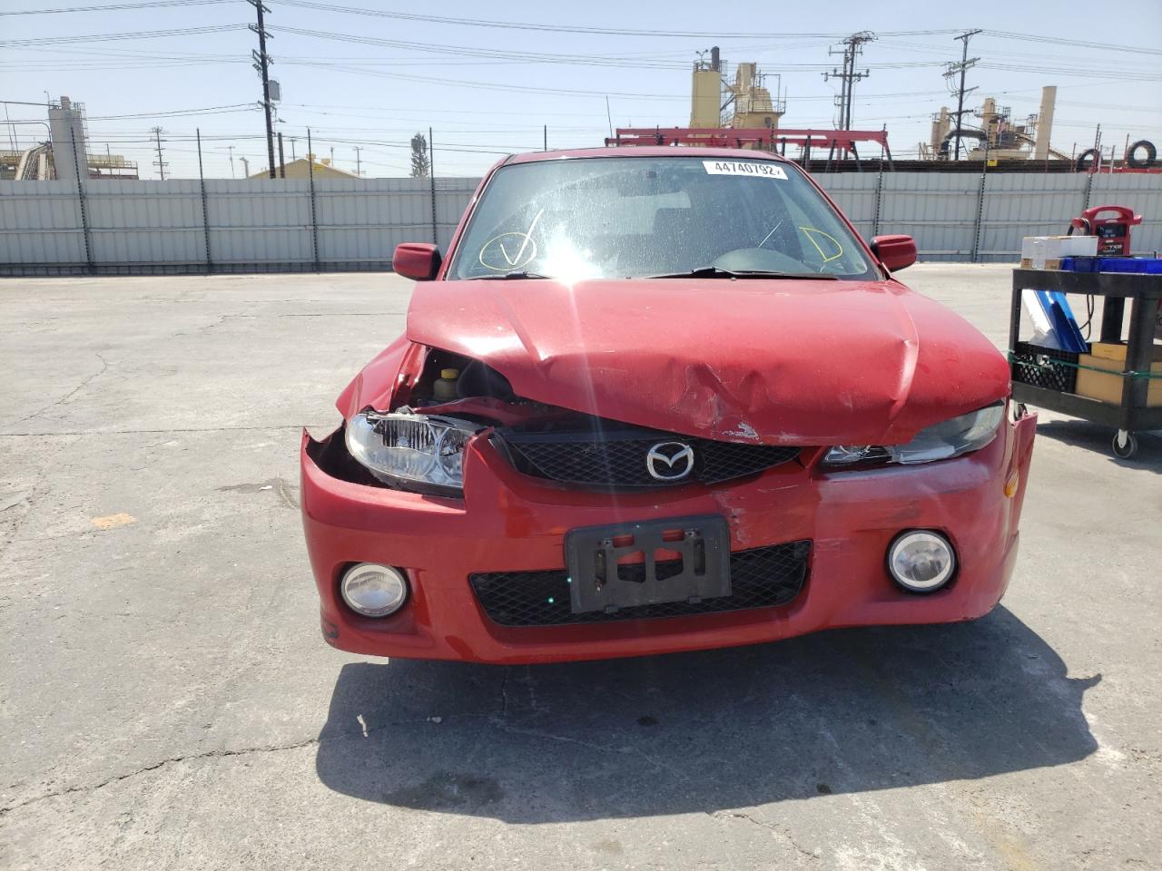 Photo 9 from auction – 2003 MAZDA PROTEGE PR with VIN JM1BJ245931149352