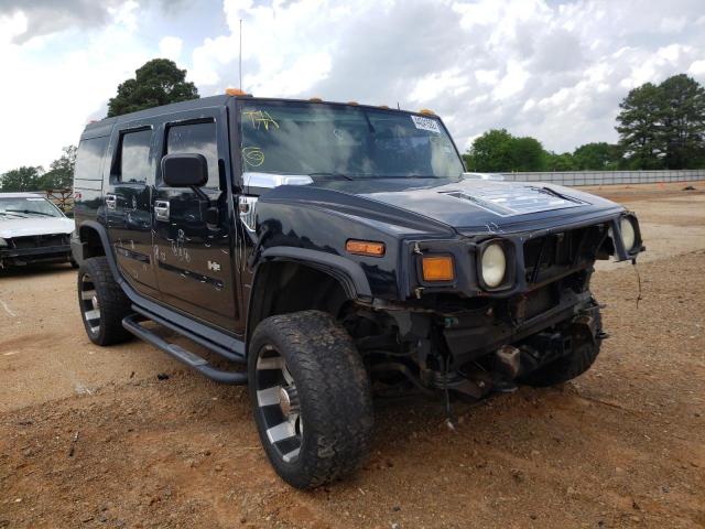 HUMMER H2 2004 with VIN 5GRGN23U74H120670 - Photo from auction