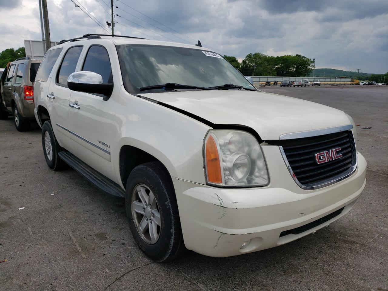 GMC YUKON SLT 2011 with VIN 1GKS2CE06BR109465 - Photo from auction
