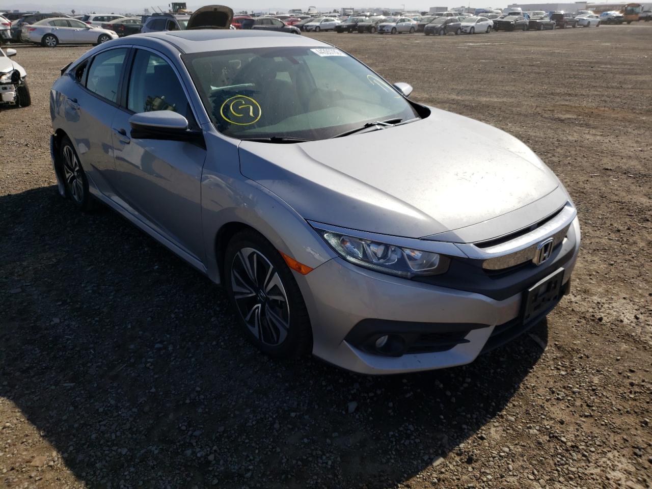 HONDA CIVIC EX 2017 with VIN 2HGFC1F31HH631017 - Photo from auction