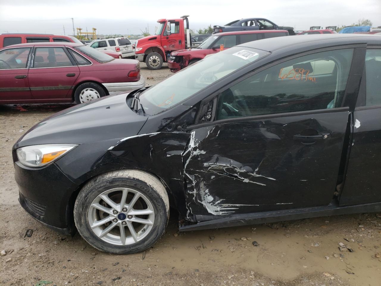 Photo 9 from auction – 2015 FORD FOCUS SE with VIN 1FADP3K27FL327148
