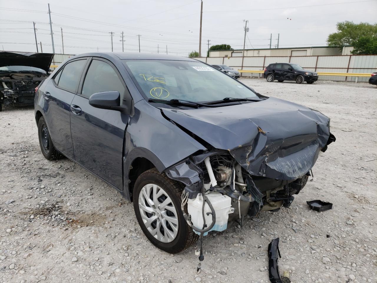 TOYOTA COROLLA L 2017 with VIN 5YFBURHEXHP728976 - Photo from auction