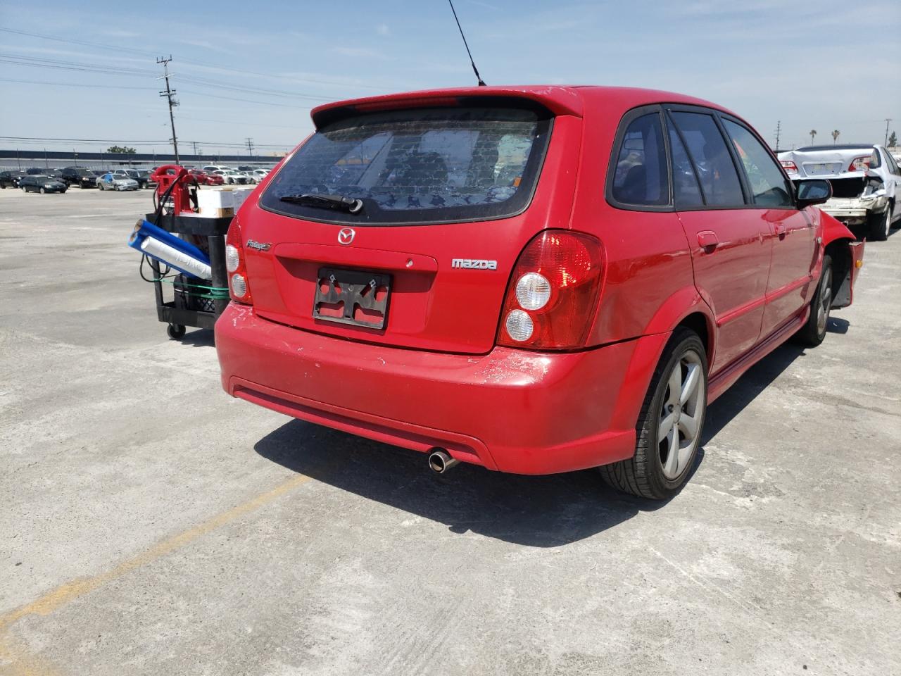 Photo 4 from auction – 2003 MAZDA PROTEGE PR with VIN JM1BJ245931149352