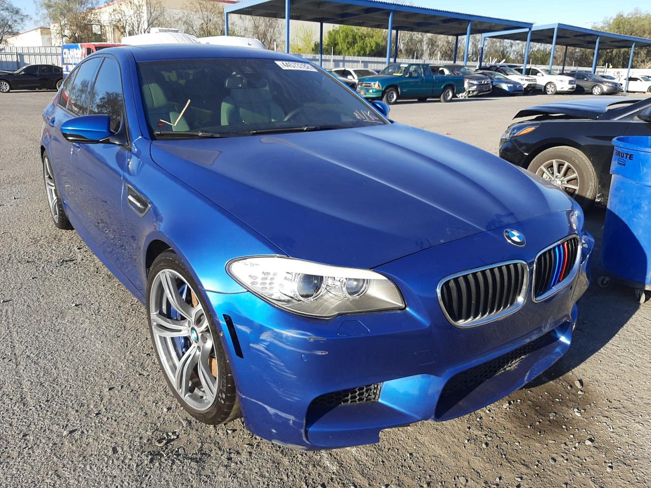 BMW M5 2013 with VIN WBSFV9C5XDC773983 - Photo from auction