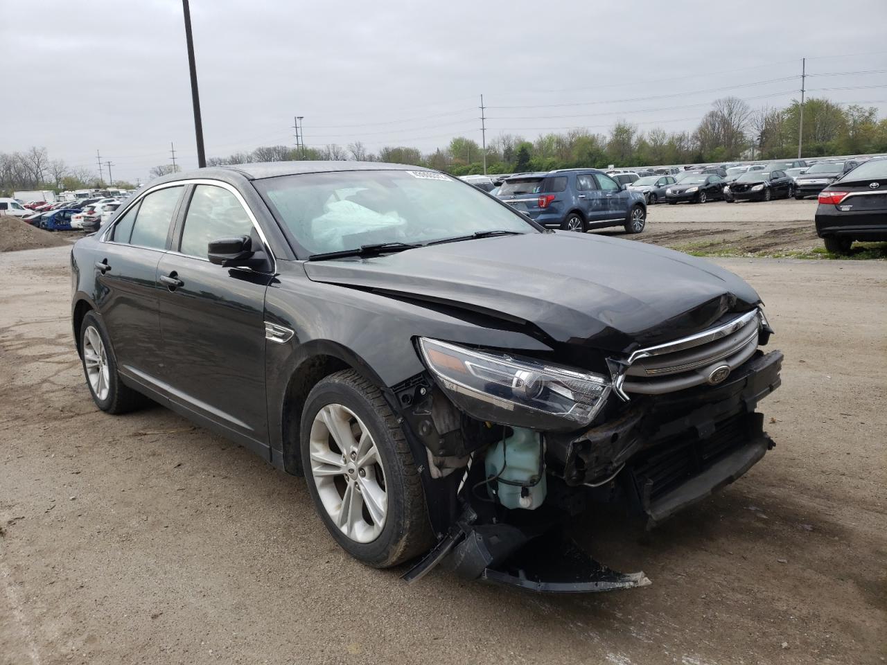 FORD TAURUS SEL 2015 with VIN 1FAHP2E80FG202643 - Photo from auction
