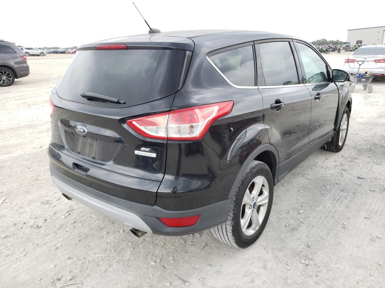 Photo 4 from auction – 2014 FORD ESCAPE SE with VIN 1FMCU0GX9EUB71359