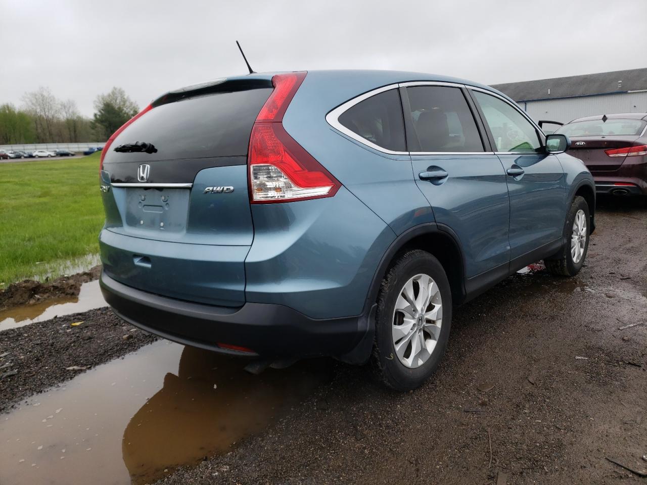 Photo 4 from auction – 2013 HONDA CR-V EX with VIN 5J6RM4H58DL008963
