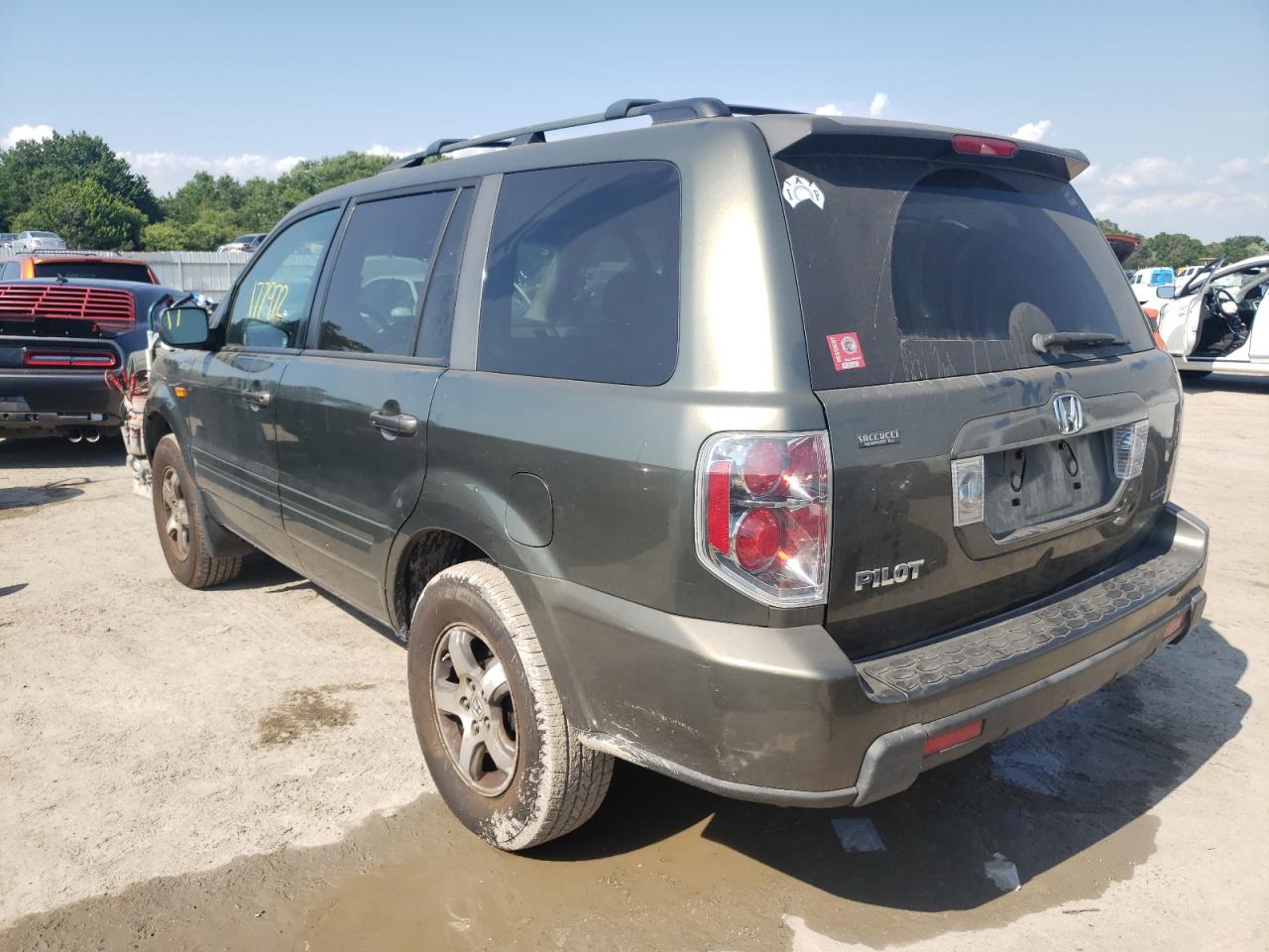 Photo 9 from auction – 2006 HONDA PILOT EX with VIN 5FNYF18486B024541