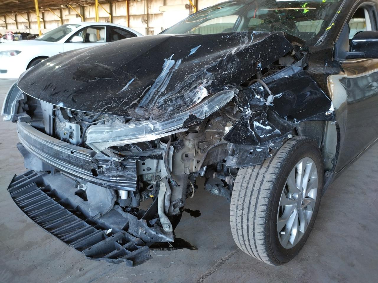 Photo 9 from auction – 2016 NISSAN SENTRA S with VIN 3N1AB7AP1GY315475