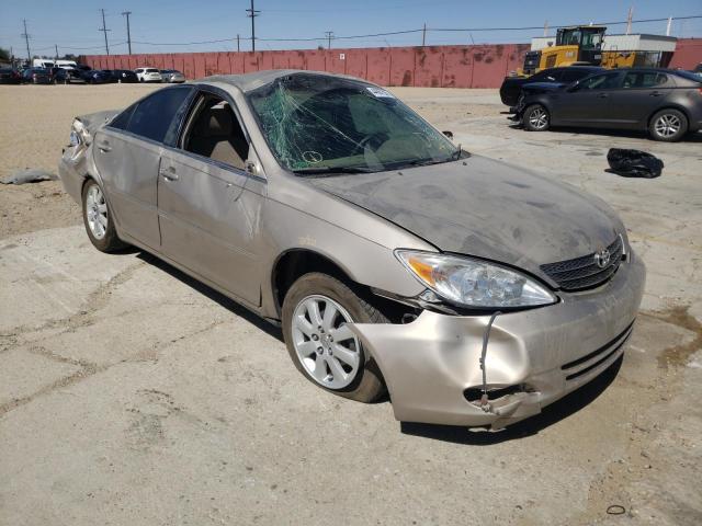 TOYOTA CAMRY LE 2003 with VIN 4T1BE32K73U725601 - Photo from auction