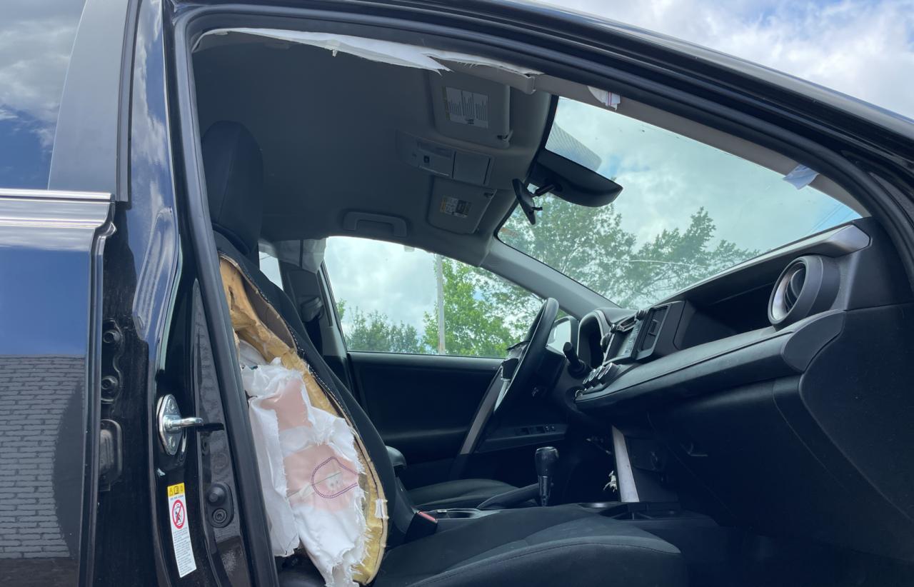 Photo 5 from auction – 2018 TOYOTA RAV4 LE with VIN 2T3ZFREV2JW411122
