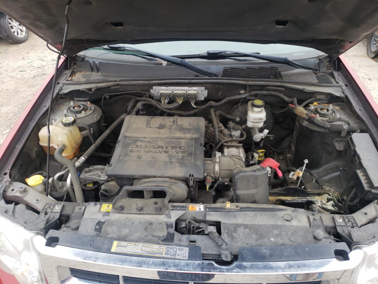 Photo 7 from auction – 2011 FORD ESCAPE LIM with VIN 1FMCU9EG1BKA54390