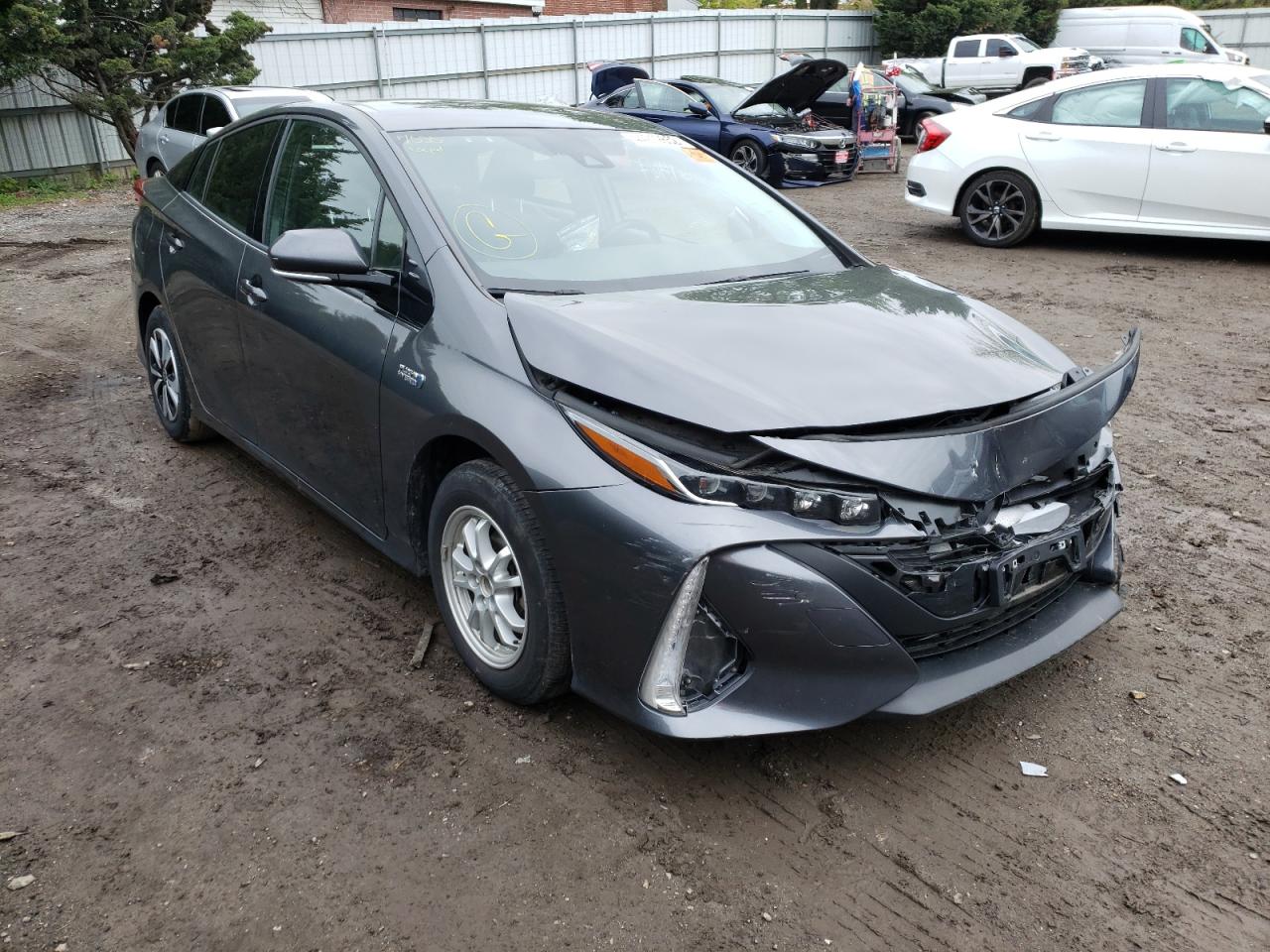 TOYOTA PRIUS PRIM 2018 with VIN JTDKARFP0J3099904 - Photo from auction