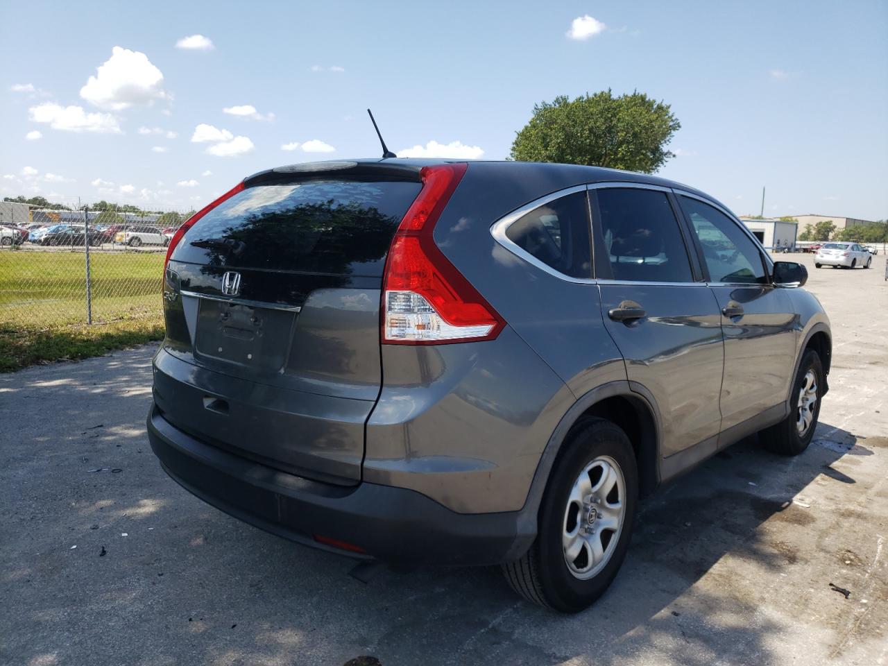 Photo 4 from auction – 2014 HONDA CR-V with VIN 3CZRM3H38EG708814