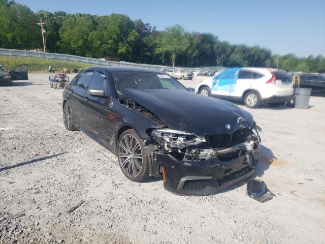 BMW M550XI 2018 with VIN WBAJB9C56JB286191 - Photo from auction