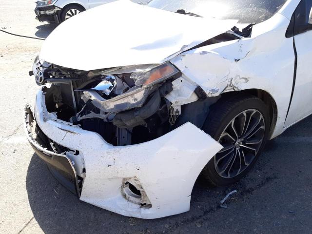 Photo 9 from auction – 2015 TOYOTA COROLLA L with VIN 5YFBURHEXFP214624