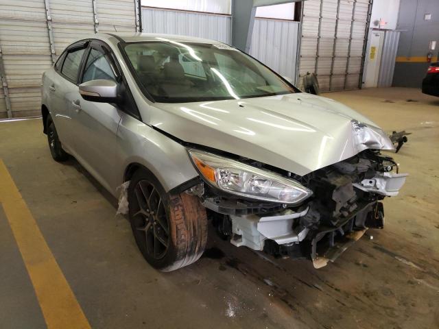 FORD FOCUS SE 2015 with VIN 1FADP3F21FL214628 - Photo from auction