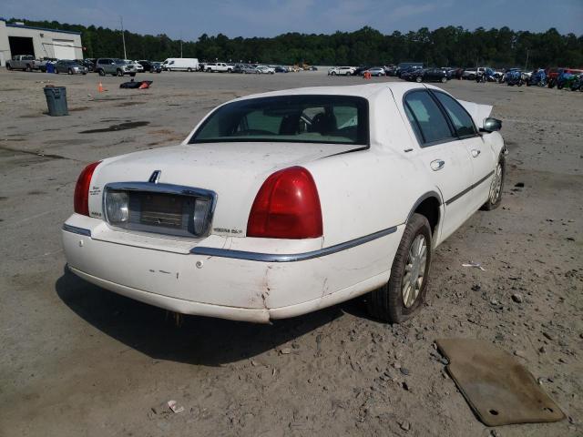 Photo 4 from auction – 2004 LINCOLN TOWN CAR E with VIN 1LNHM81W64Y633405