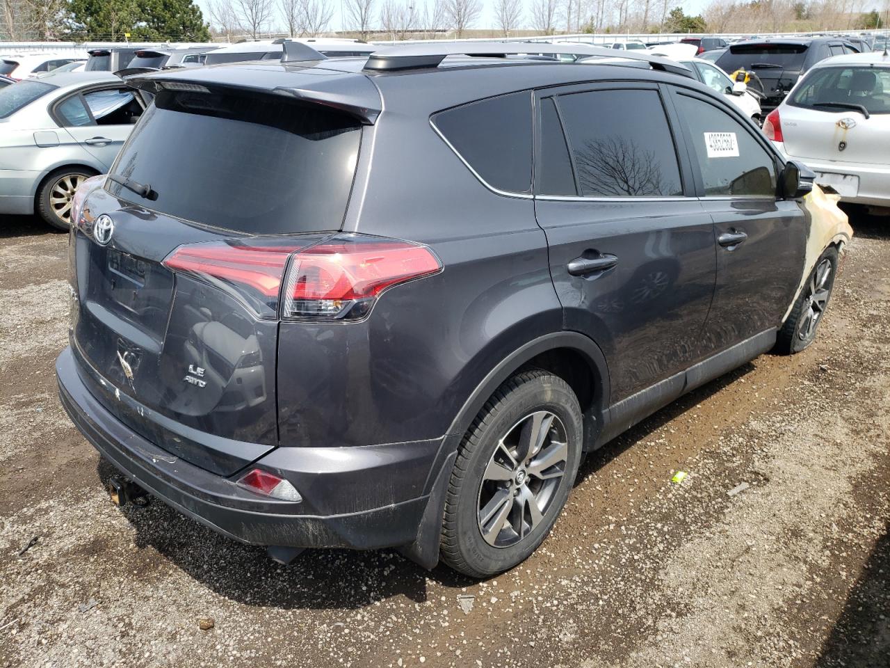 Photo 4 from auction – 2018 TOYOTA RAV4 LE with VIN 2T3BFREV5JW790991