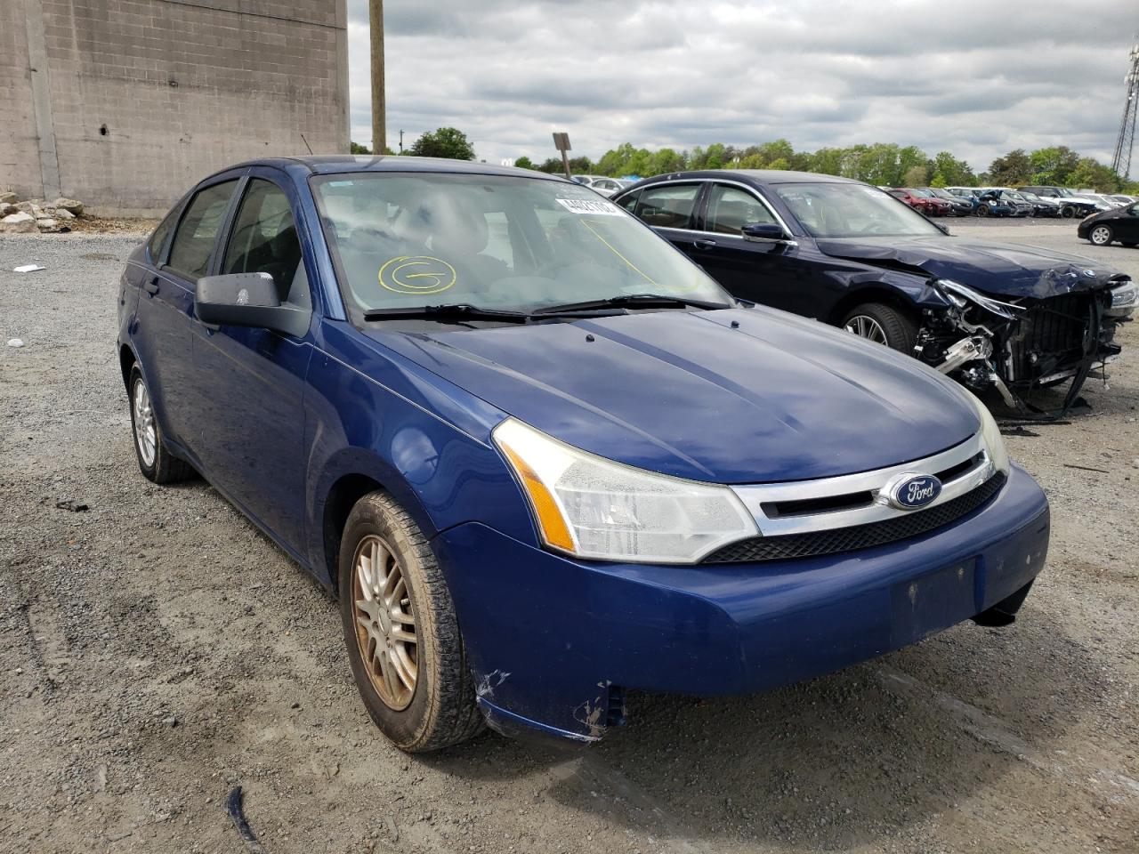 FORD FOCUS SE 2009 with VIN 1FAHP35N79W165208 - Photo from auction