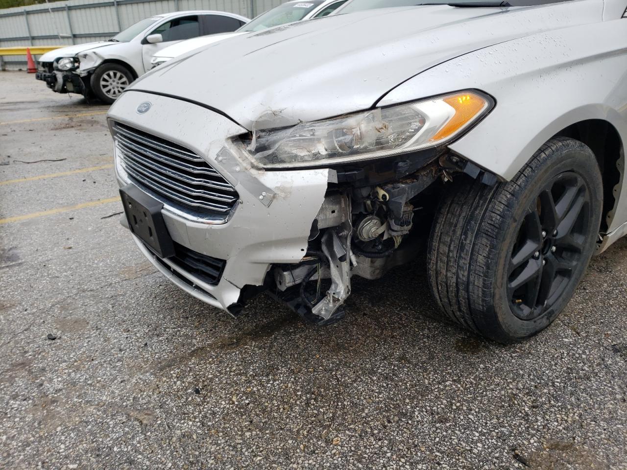 Photo 9 from auction – 2013 FORD FUSION SE with VIN 3FA6P0HR1DR242901