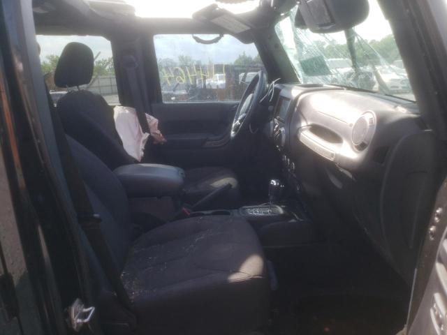 Photo 5 from auction – 2015 JEEP WRANGLER U with VIN 1C4HJWDG5FL557004