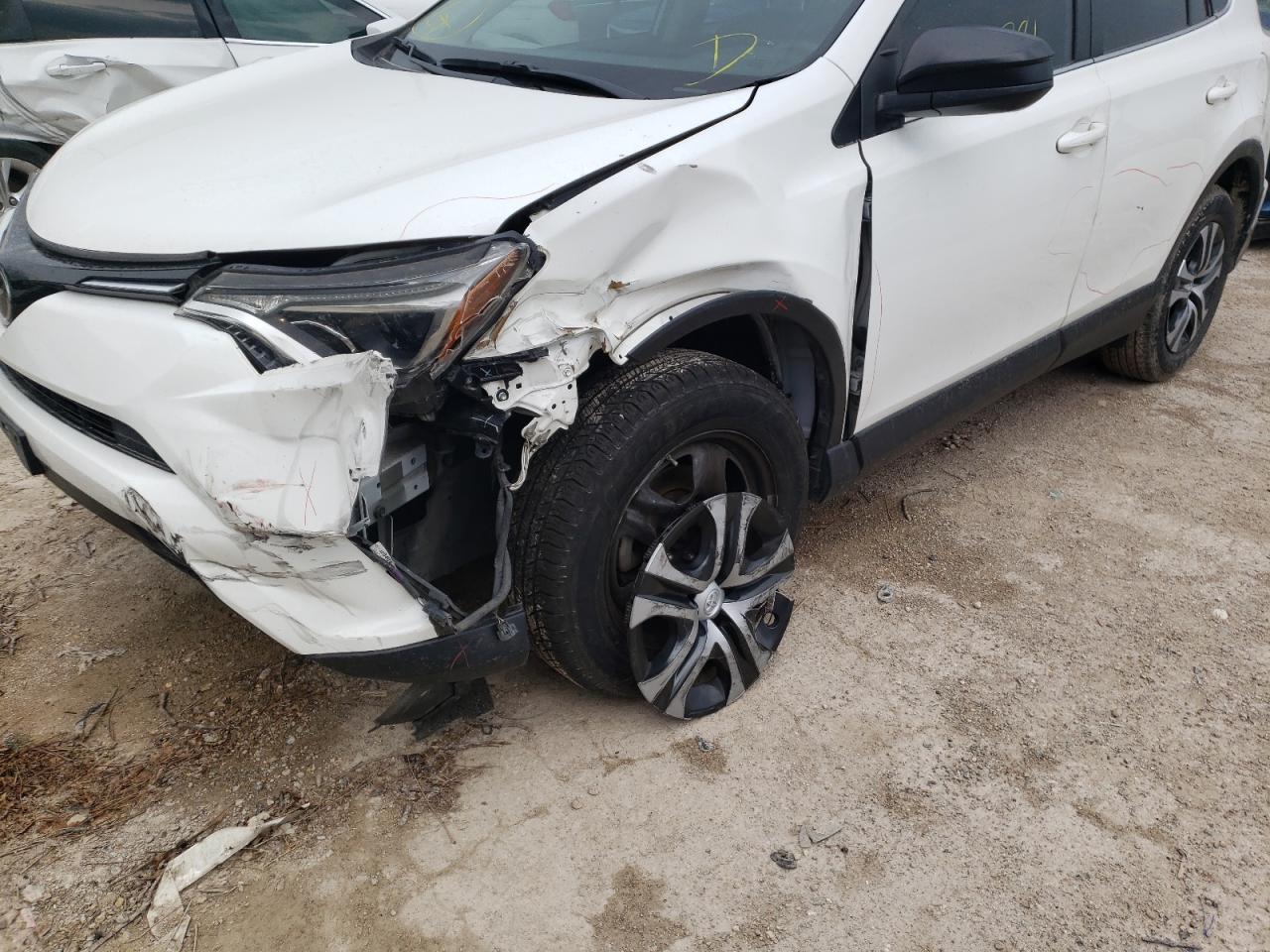 Photo 9 from auction – 2017 TOYOTA RAV4 LE with VIN JTMZFREVXHJ704257