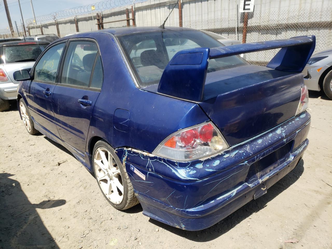 Photo 3 from auction – 2003 MITSUBISHI LANCER OZ with VIN JA3AJ86EX3U003244