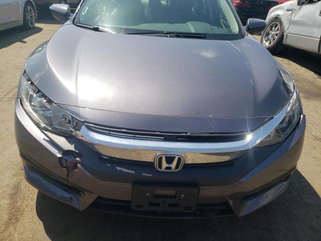 Photo 9 from auction – 2018 HONDA CIVIC LX with VIN 19XFC2F52JE200841