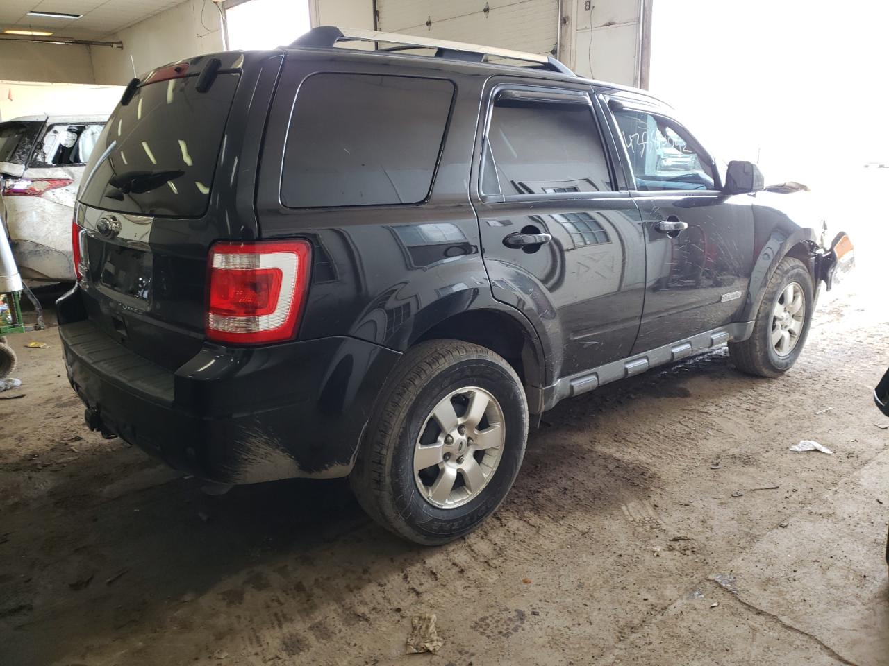 Photo 4 from auction – 2011 FORD ESCAPE LIM with VIN 1FMCU9EG6BKC15171