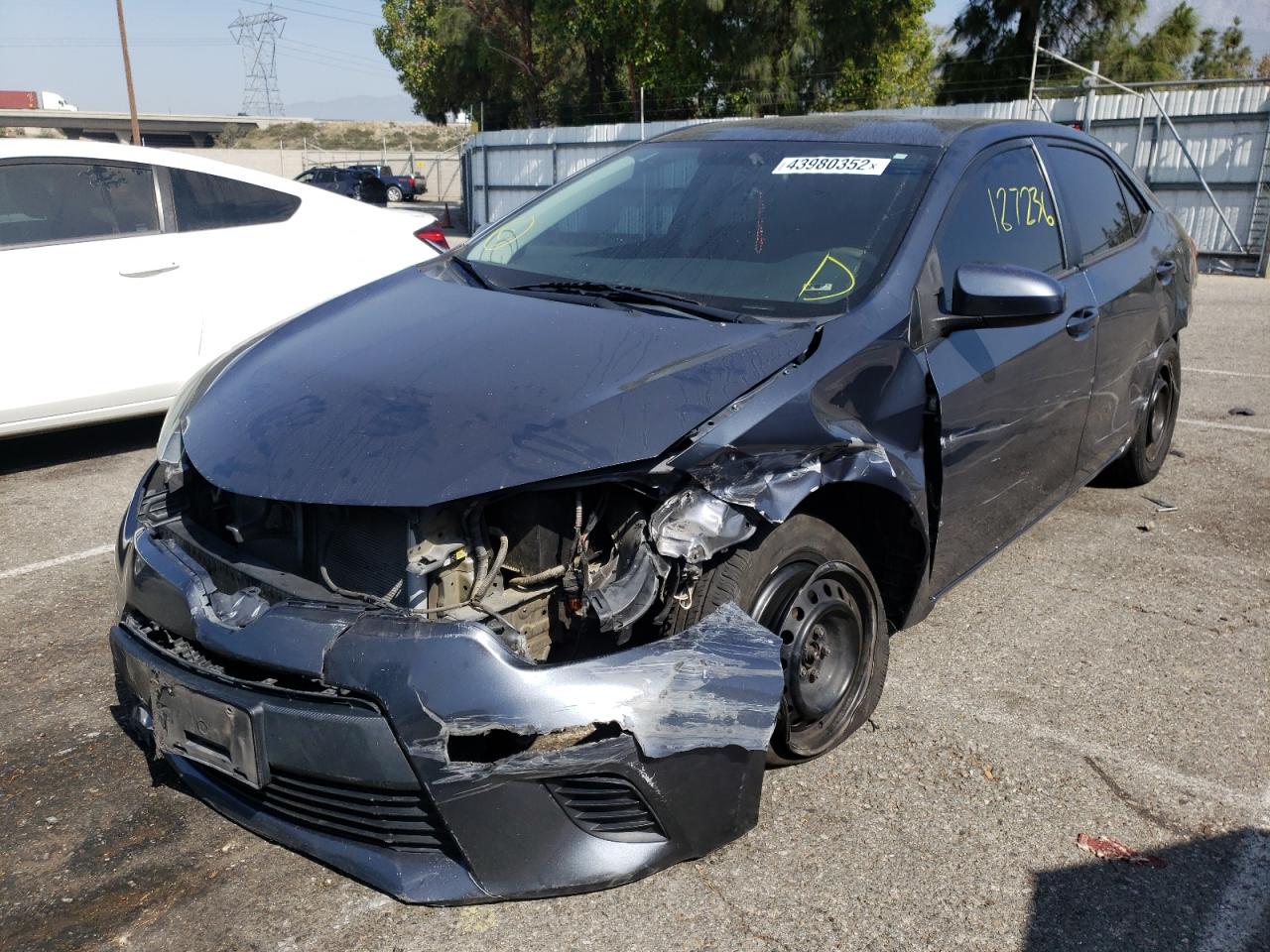 Photo 2 from auction – 2015 TOYOTA COROLLA L with VIN 5YFBURHE1FP306284