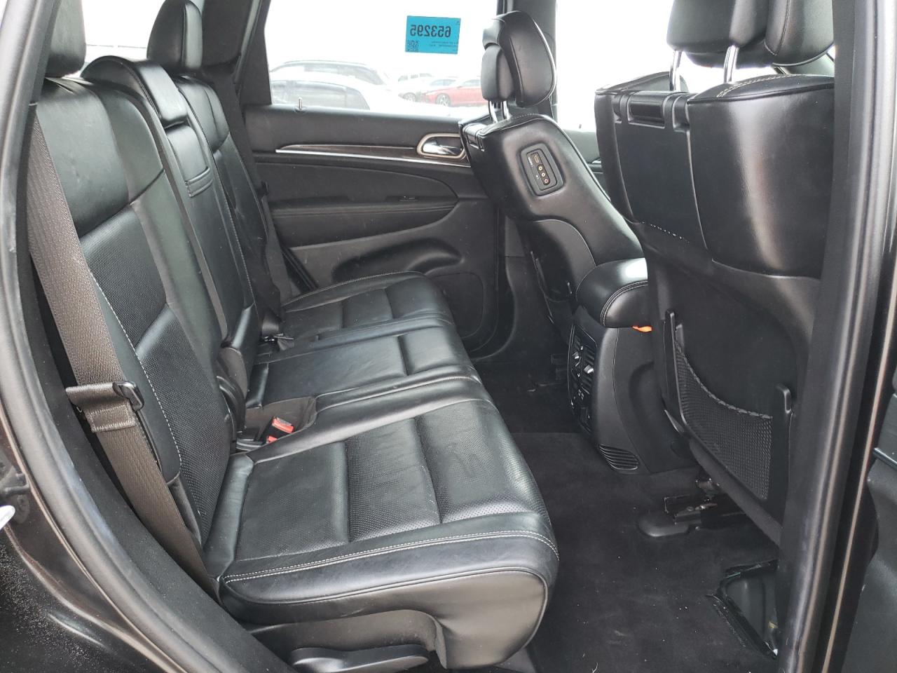 Photo 6 from auction – 2014 JEEP GRAND CHER with VIN 1C4RJECMXEC437963