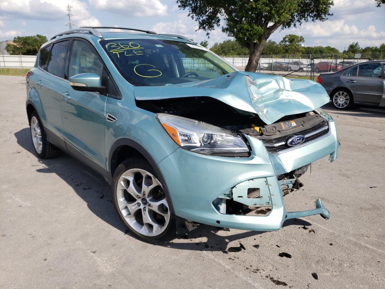 FORD ESCAPE TIT 2013 with VIN 1FMCU0J99DUD49425 - Photo from auction