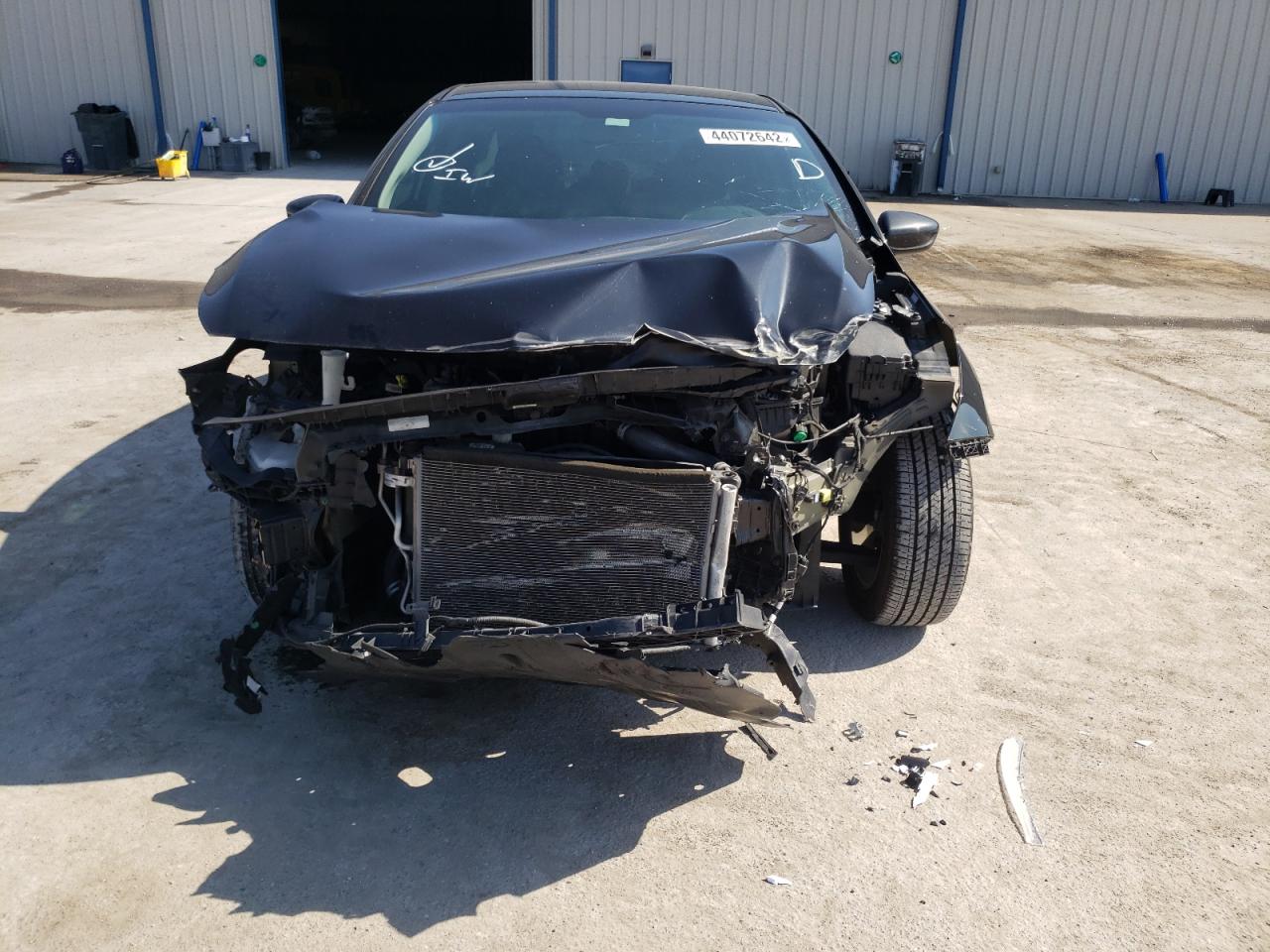 Photo 9 from auction – 2017 KIA FORTE LX with VIN 3KPFL4A75HE033342