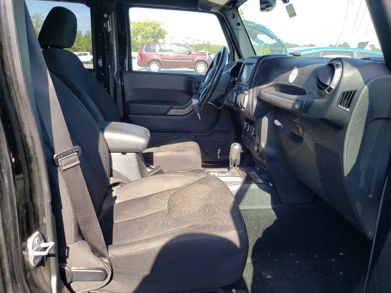 Photo 5 from auction – 2016 JEEP WRANGLER U with VIN 1C4BJWDG0GL114945