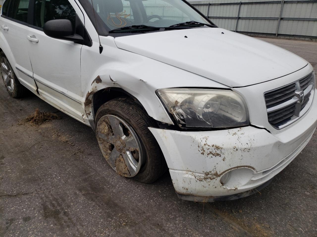 Photo 9 from auction – 2011 DODGE CALIBER RU with VIN 1B3CB8HB1BD296297