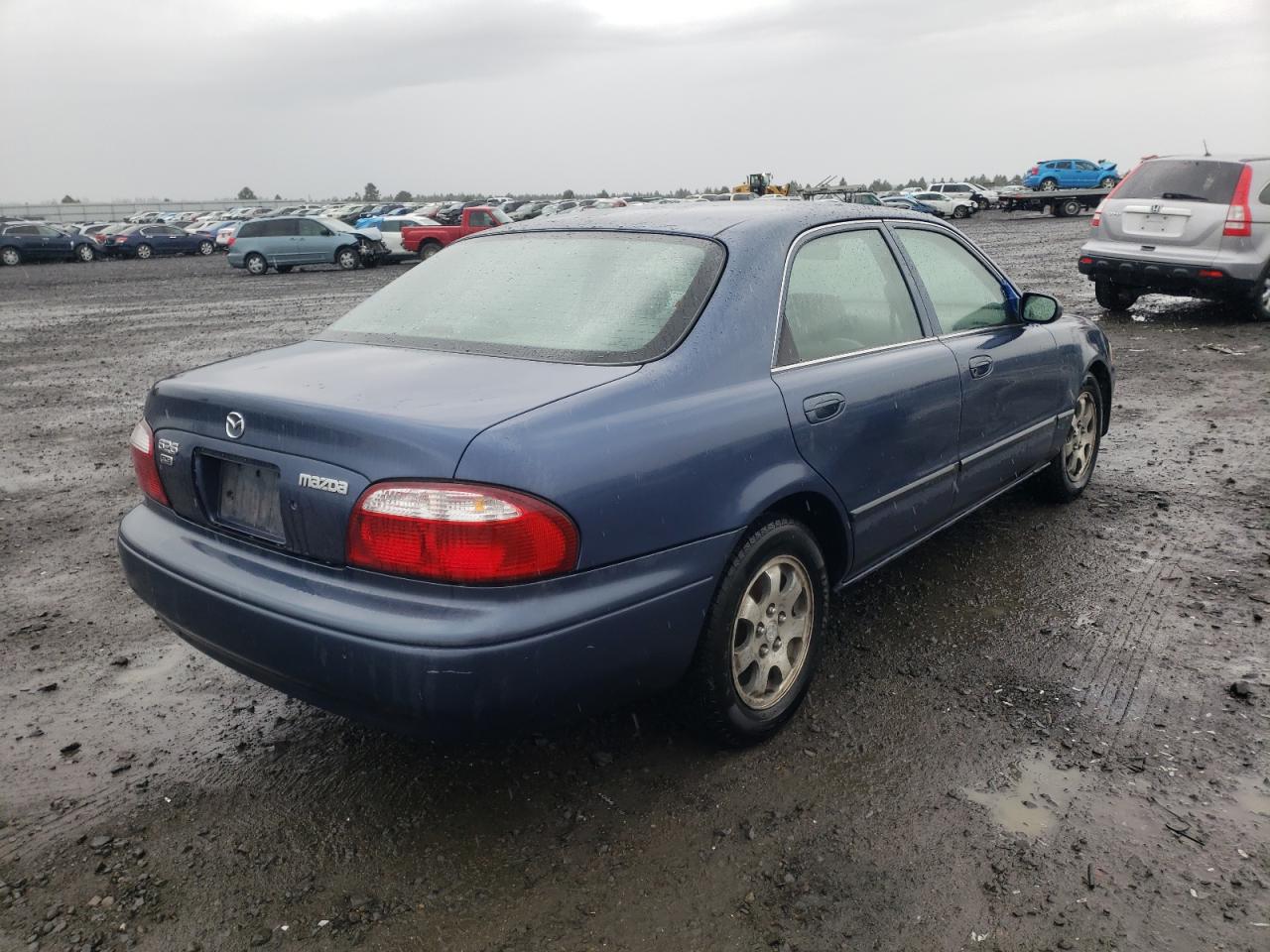 Photo 4 from auction – 2001 MAZDA 626 ES with VIN 1YVGF22C215203163