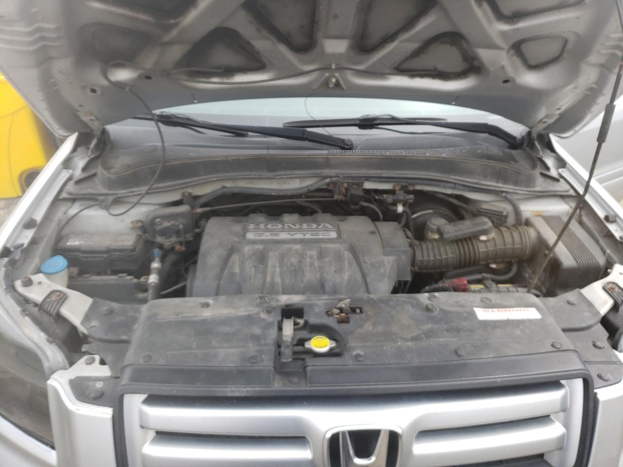 Photo 7 from auction – 2006 HONDA PILOT EX with VIN 2HKYF18786H538529