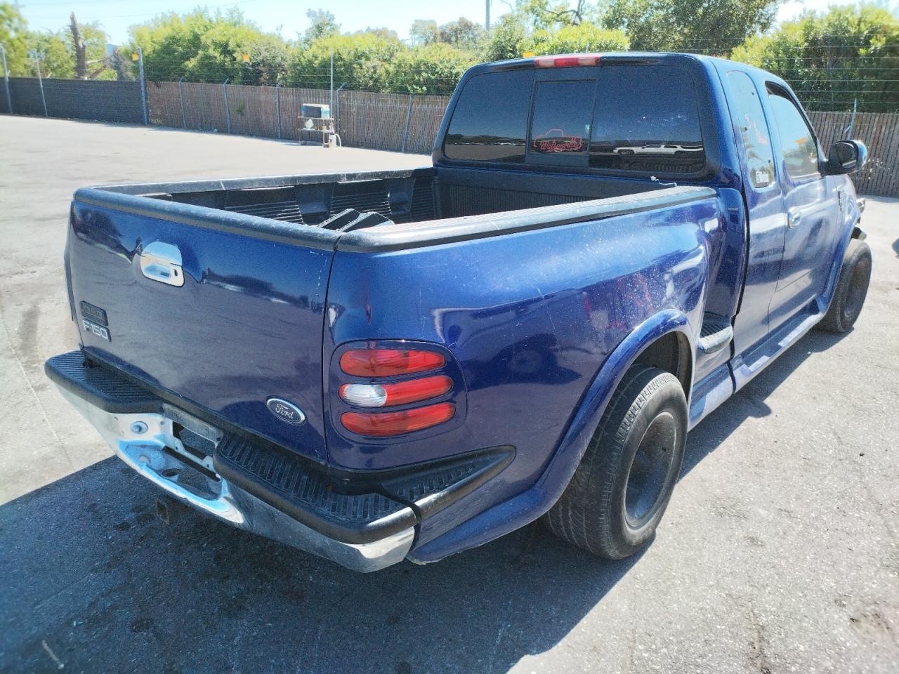Photo 4 from auction – 1998 FORD F150 with VIN 2FTZX0765WCA19058