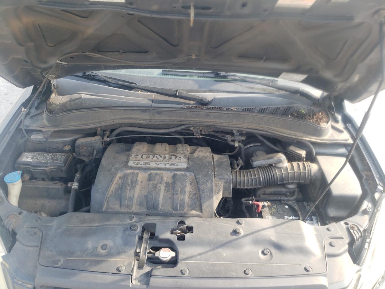 Photo 7 from auction – 2005 HONDA PILOT EXL with VIN 5FNYF18535B049760
