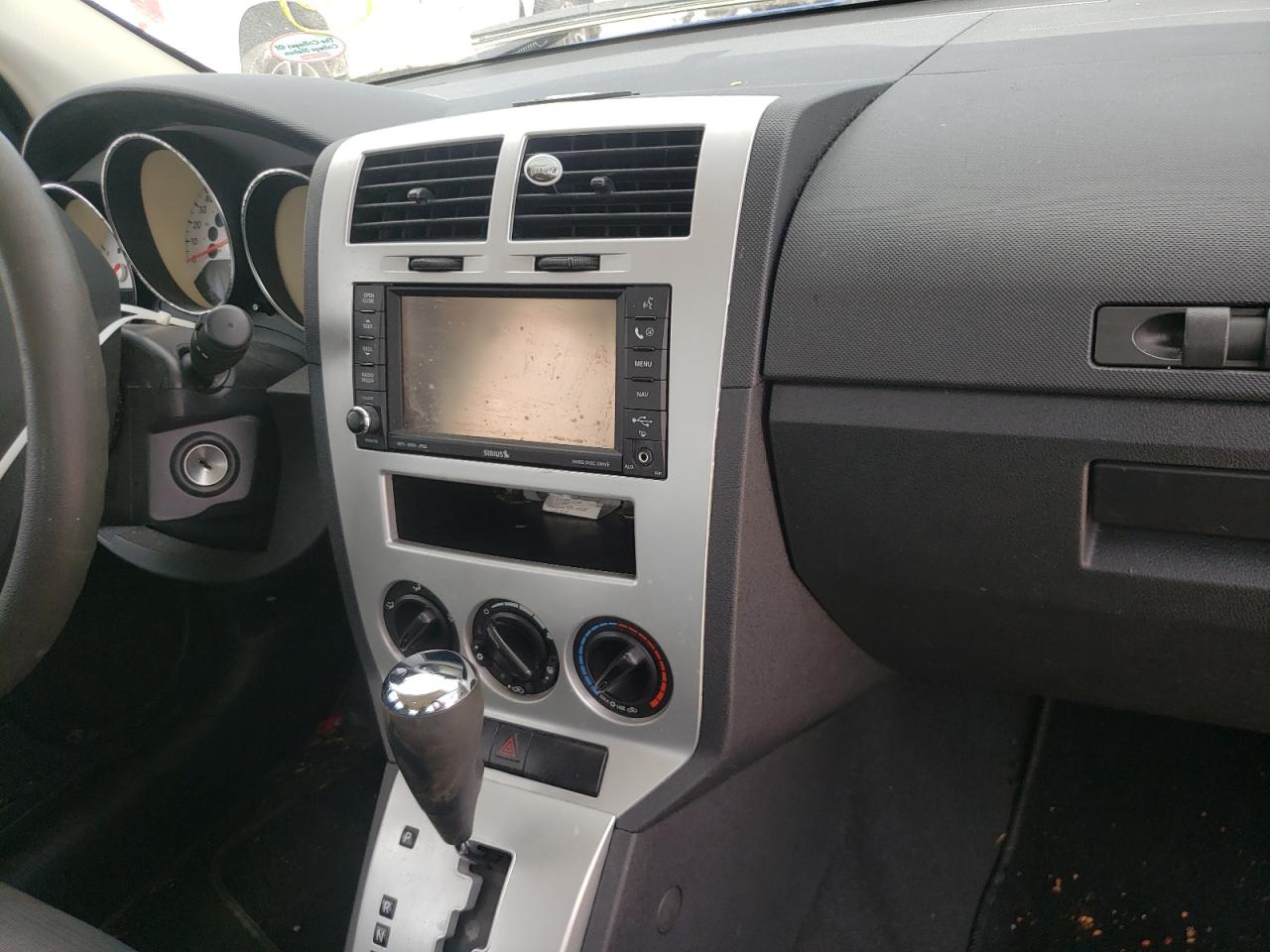 Photo 9 from auction – 2009 DODGE CALIBER SX with VIN 1B3HB48A09D133348