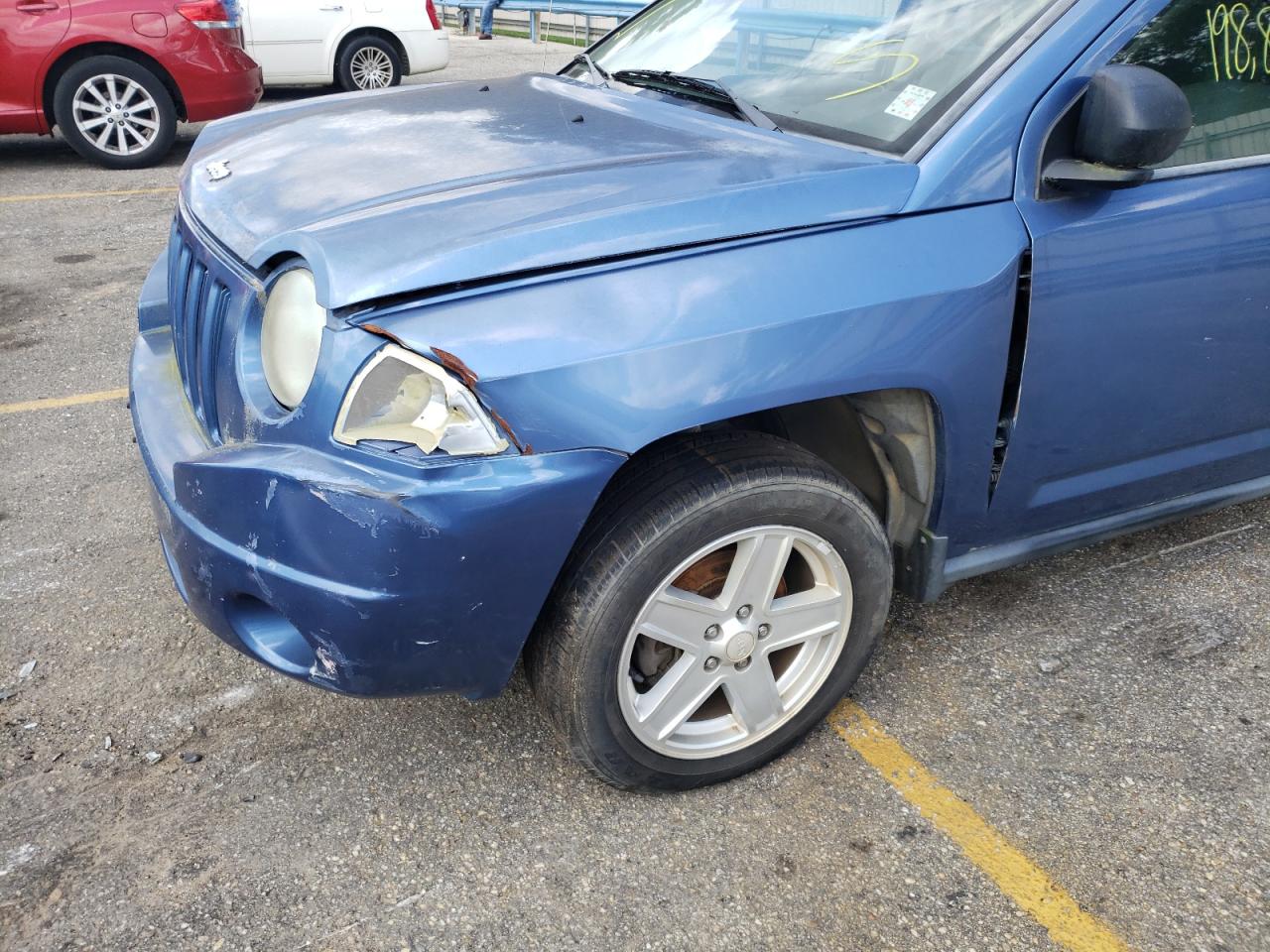 Photo 9 from auction – 2007 JEEP COMPASS with VIN 1J8FT47W07D221872