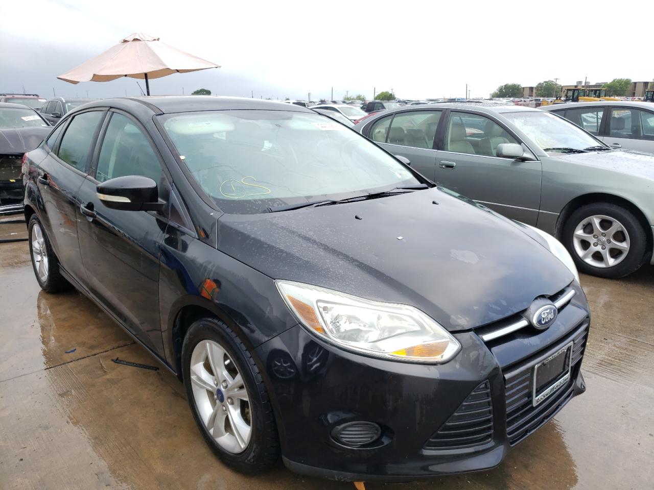 FORD FOCUS SE 2014 with VIN 1FADP3F24EL324328 - Photo from auction